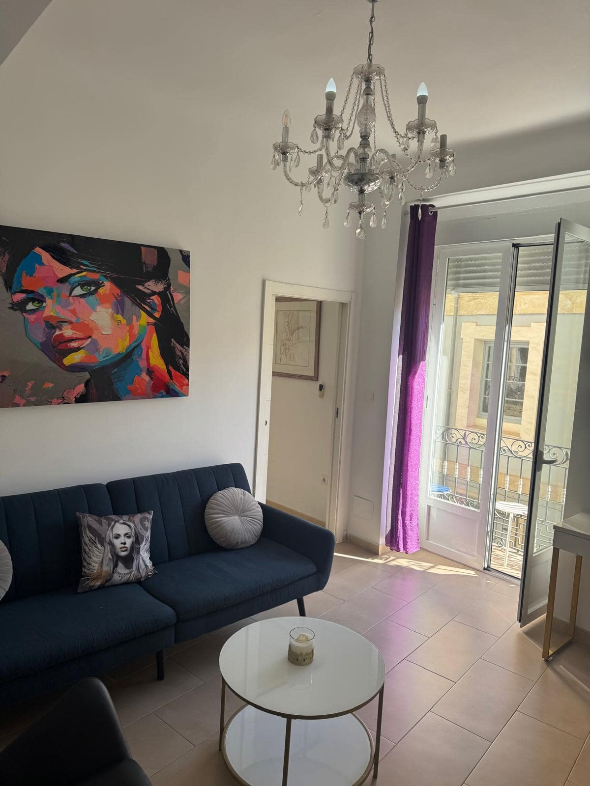 Bright and modern living room in Alicante vacation apartment.